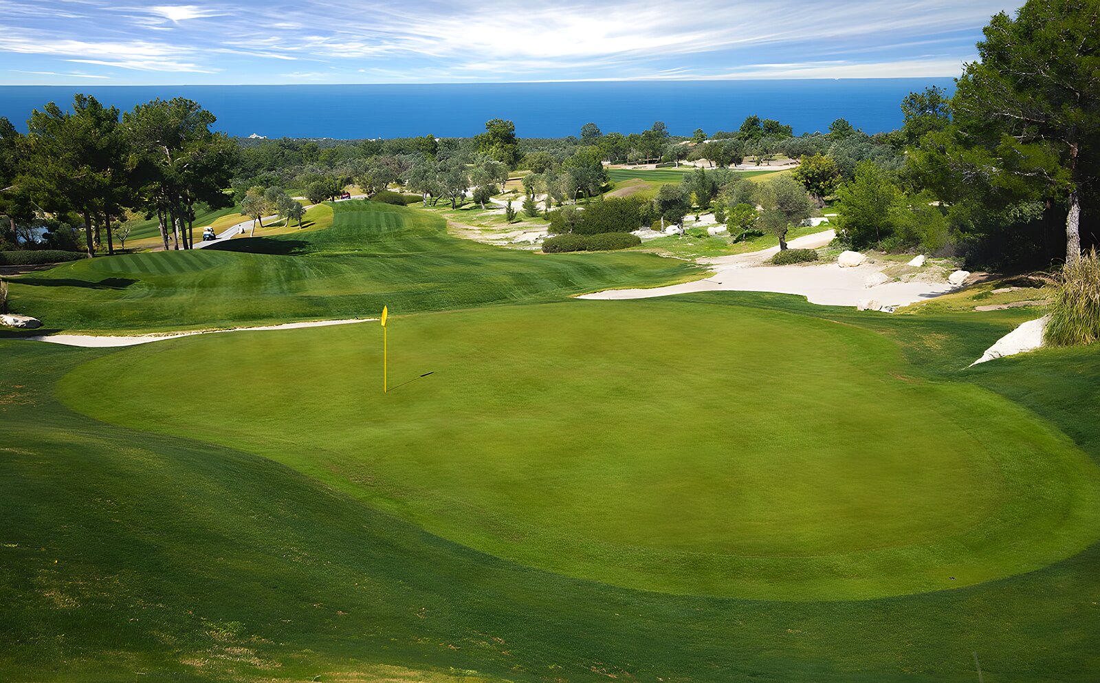 Golf course with mountains in the background